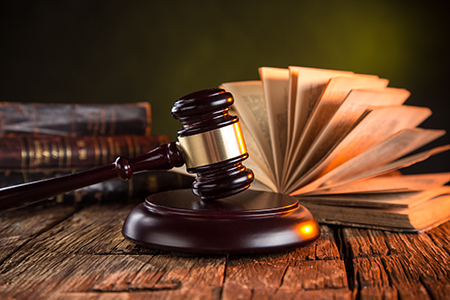 Gavel and legal books on a desk