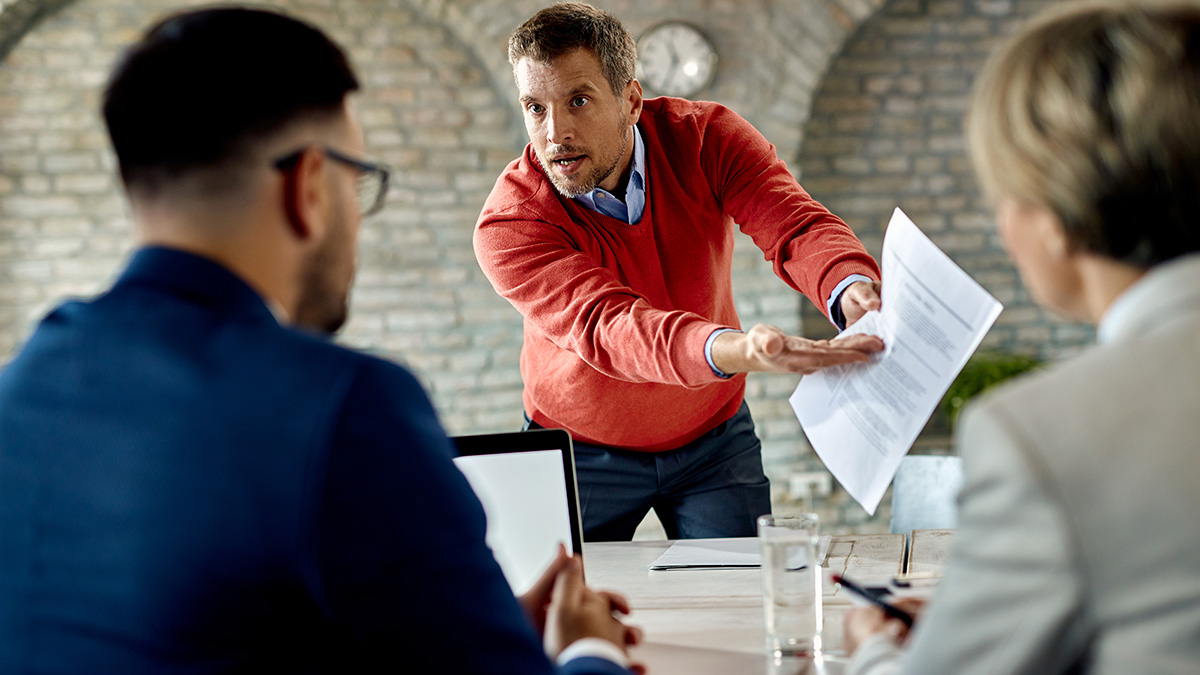 Displeased Employee Discussing Contract Office Setting