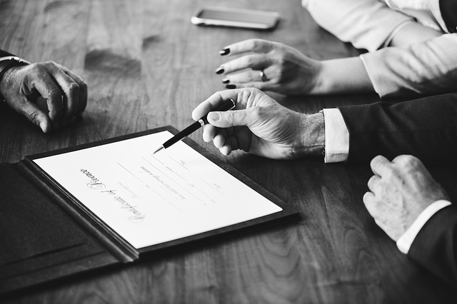 sign paperwork BW